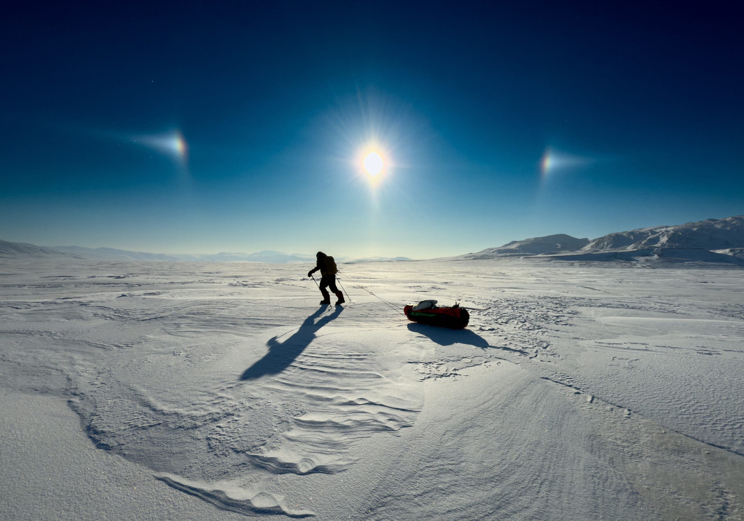 after a cancer diagnosis, ray zahab carries a sled across the tundra