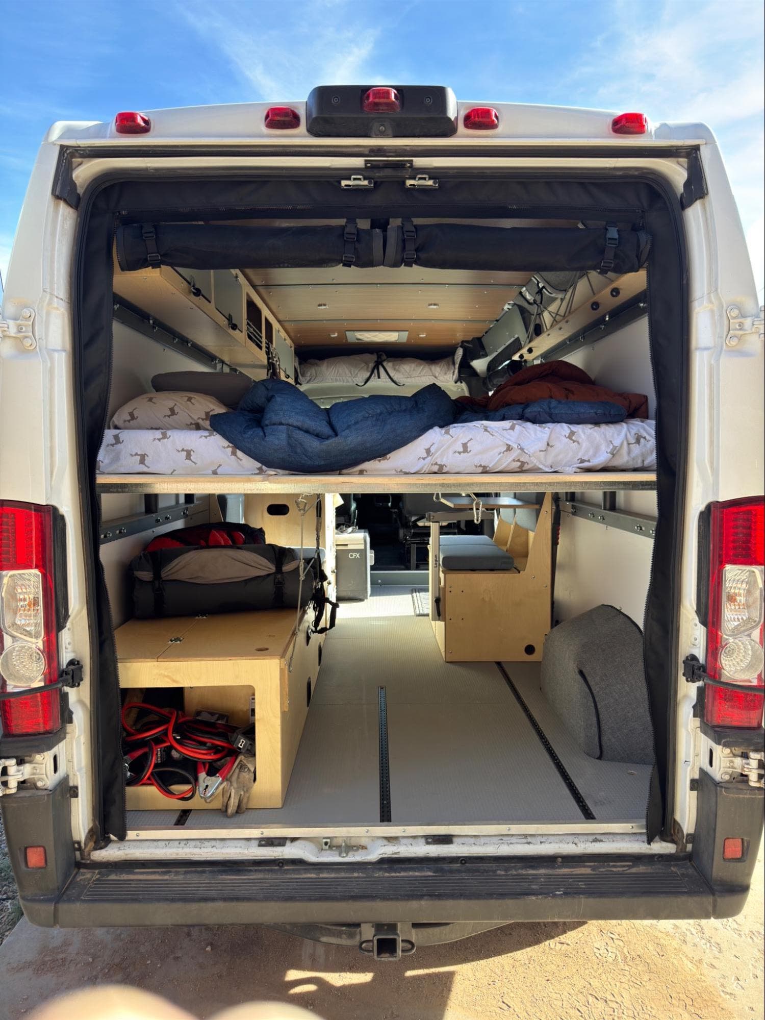Back view of a converted Ram Promaster camper van