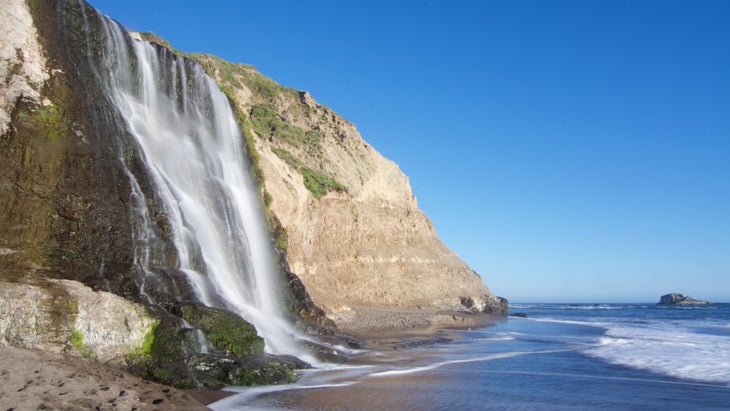 Waterfall onto beach