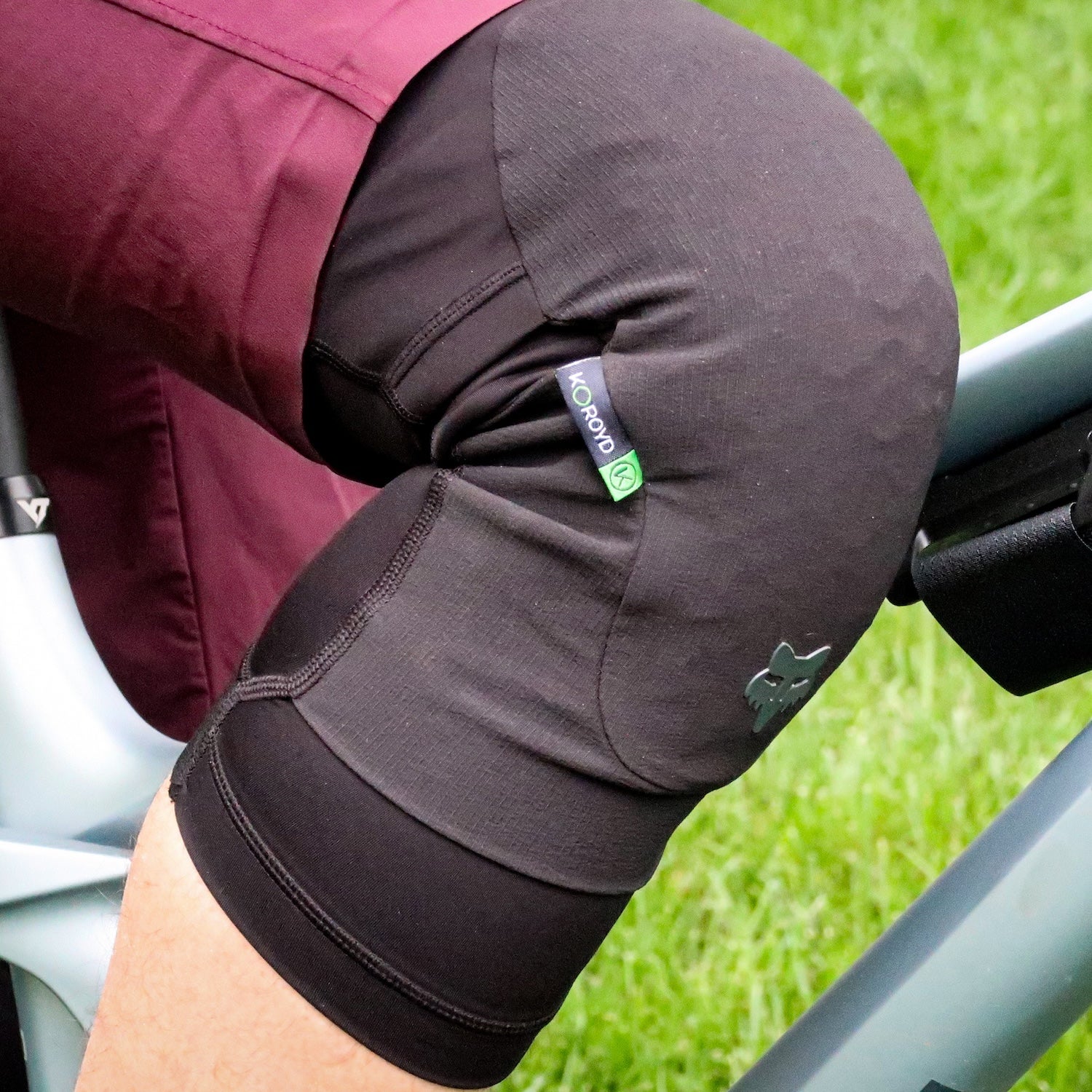 close up of a mountain bike rider wearing fox kneepads