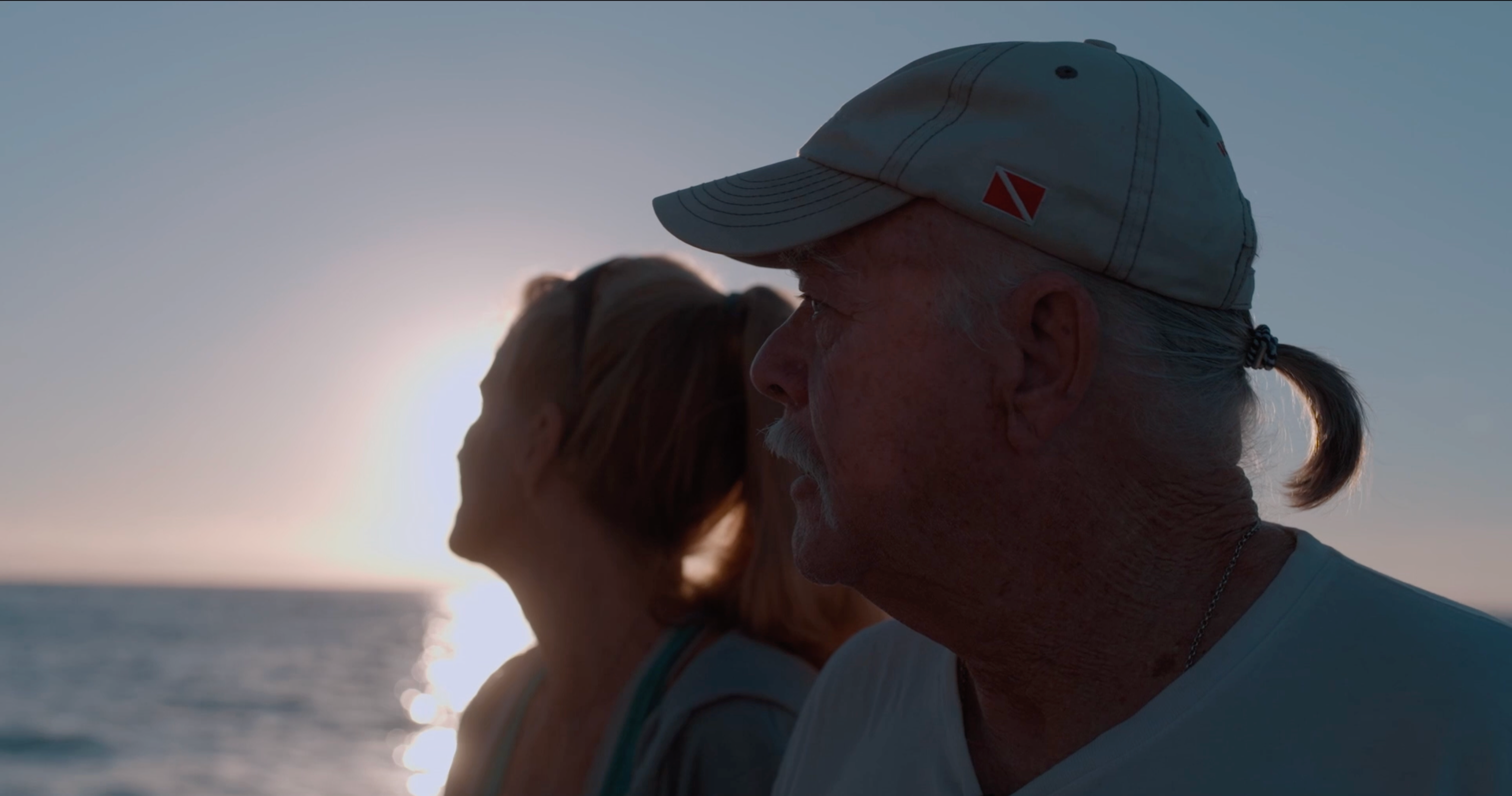 Terry Kennedy and his wife Dawn, watch the sunrise before the last dive. 
