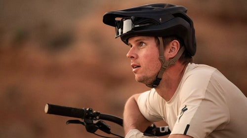 man wearing specialized bike helmet and smith sunglasses
