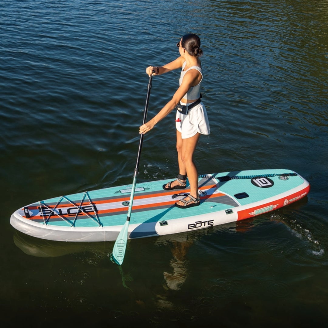 woman stand up paddleboarding