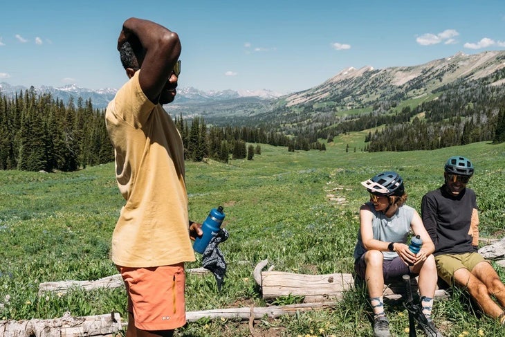 Three mountain bikers taking a break in Montana