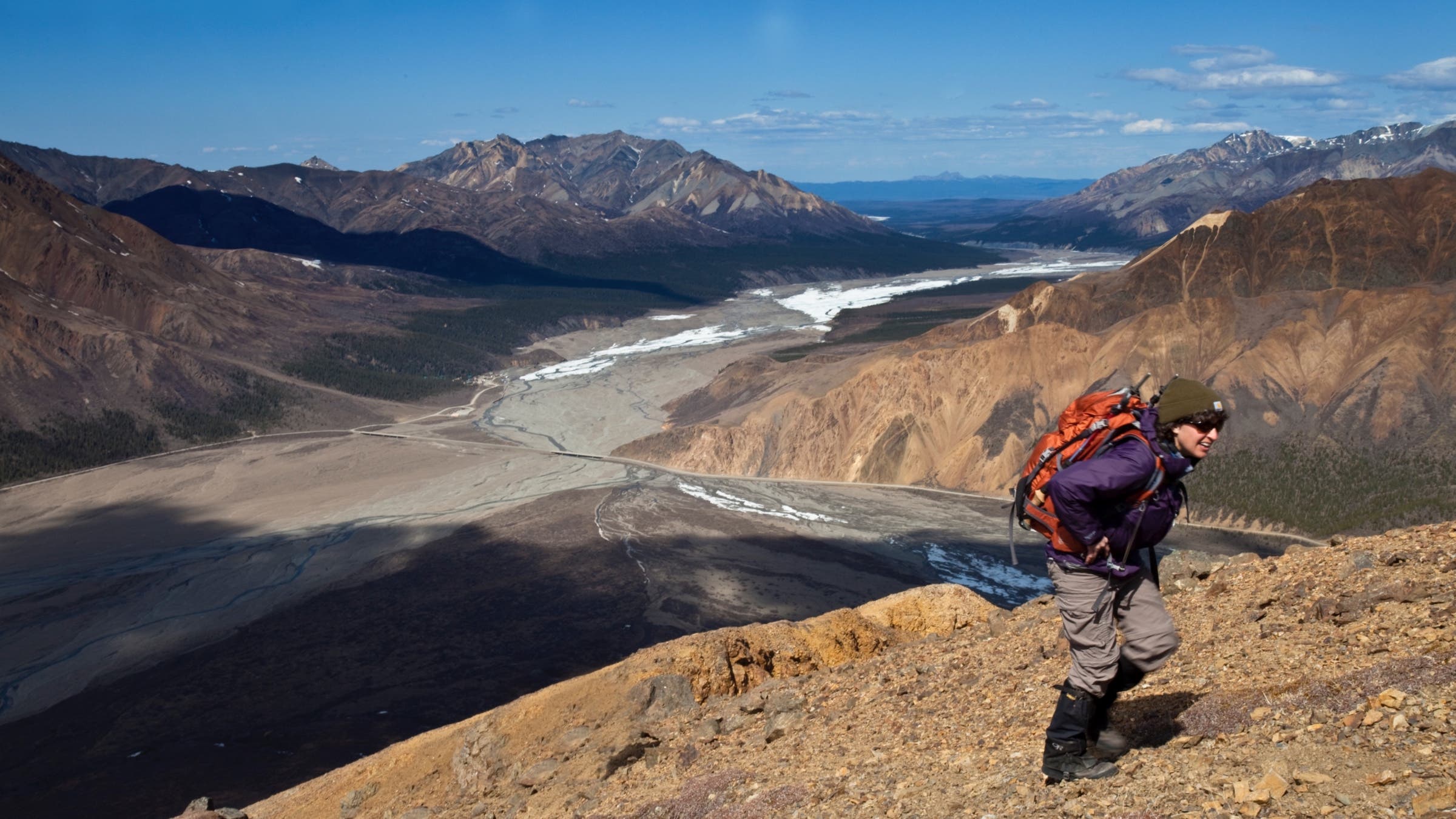 Hiker on scree field
