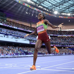 Faith Kipyegon of Team Kenya celebrates winning the Gold medal and setting a new Olympic record in the Women's 1500m Final on day fifteen of the Olympic Games Paris 2024 at Stade de France on August 10, 2024 in Paris, France.