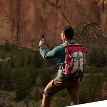 man using garmin on a hike