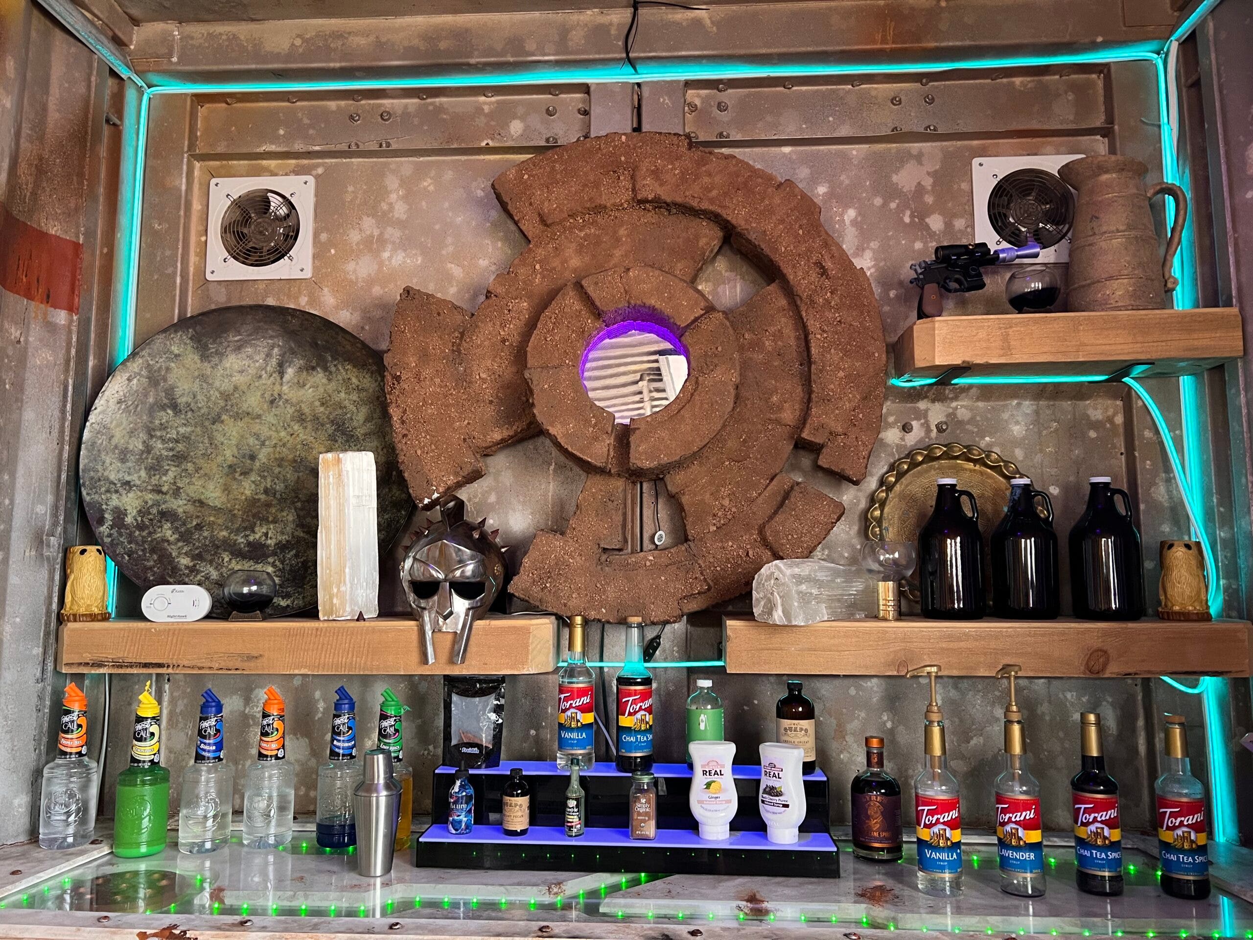 a bar of syrups and bottles