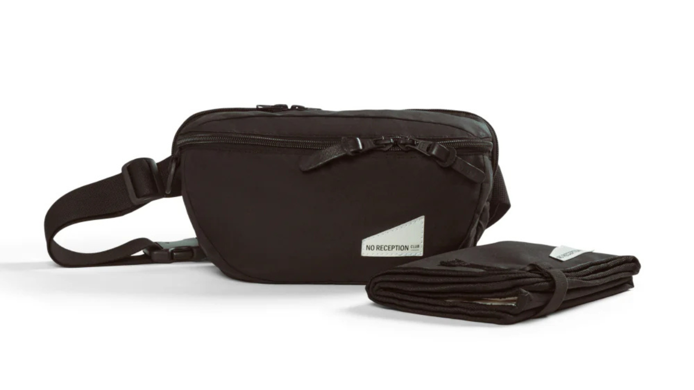 product photo of black fanny pack with insert and tag that reads "No Reception Club"