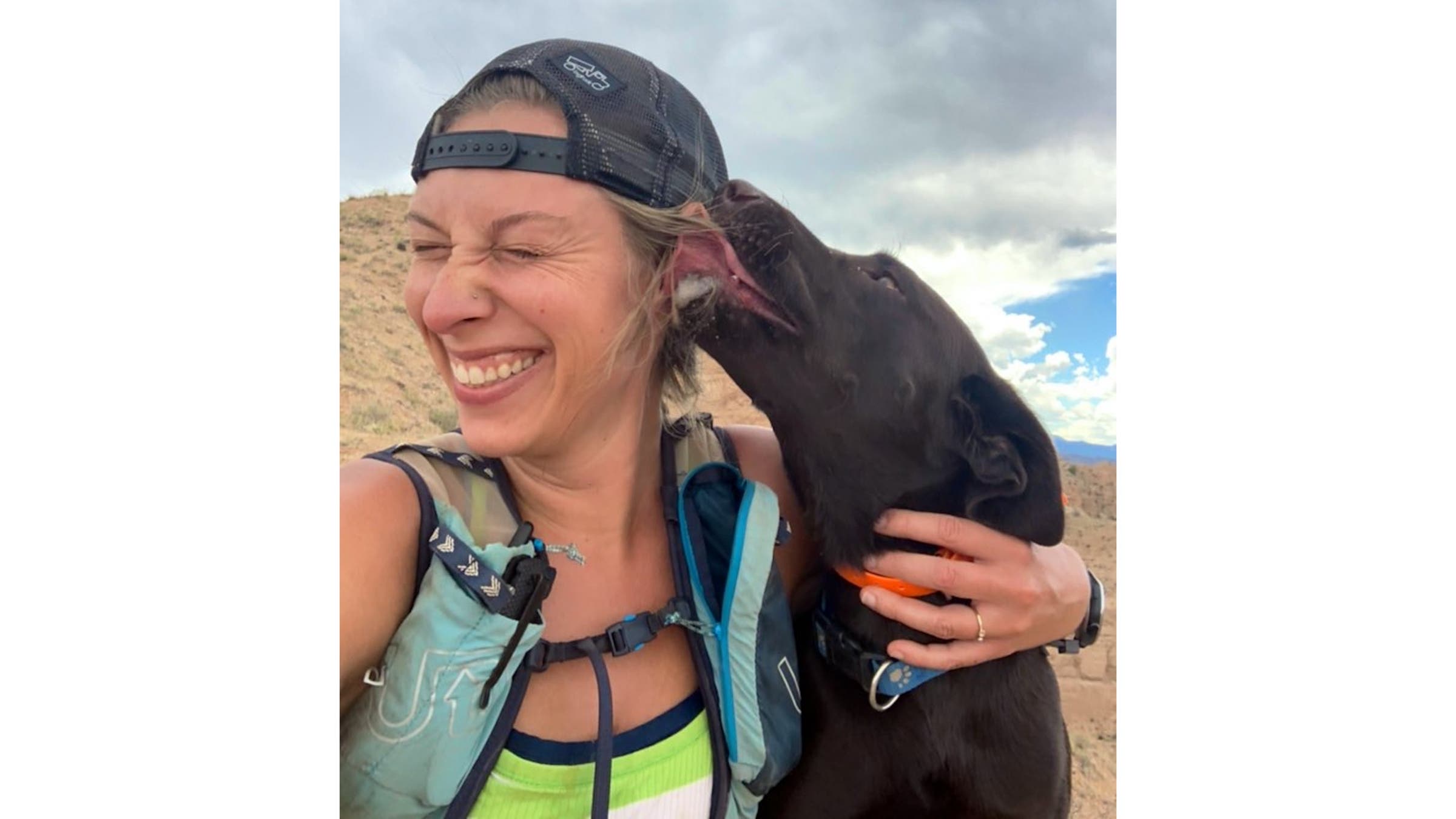 dog licking woman's face