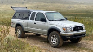 stock Toyota Tacoma with camper top