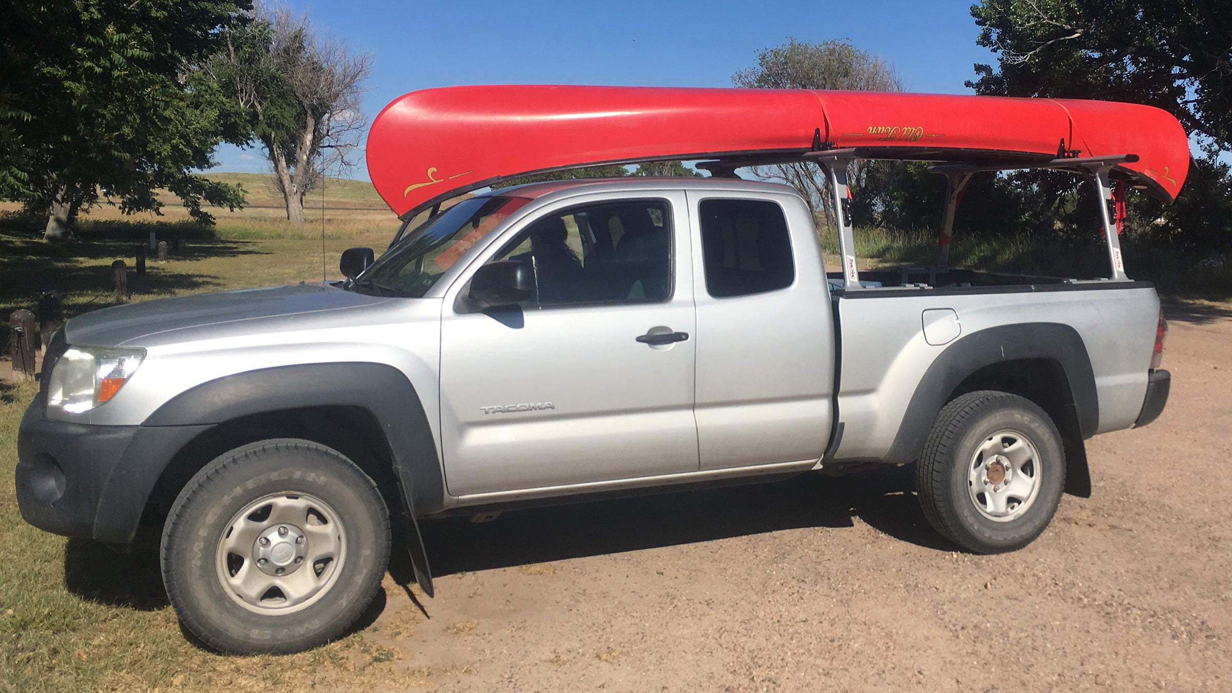 Toyota Tacoma with canoe on top