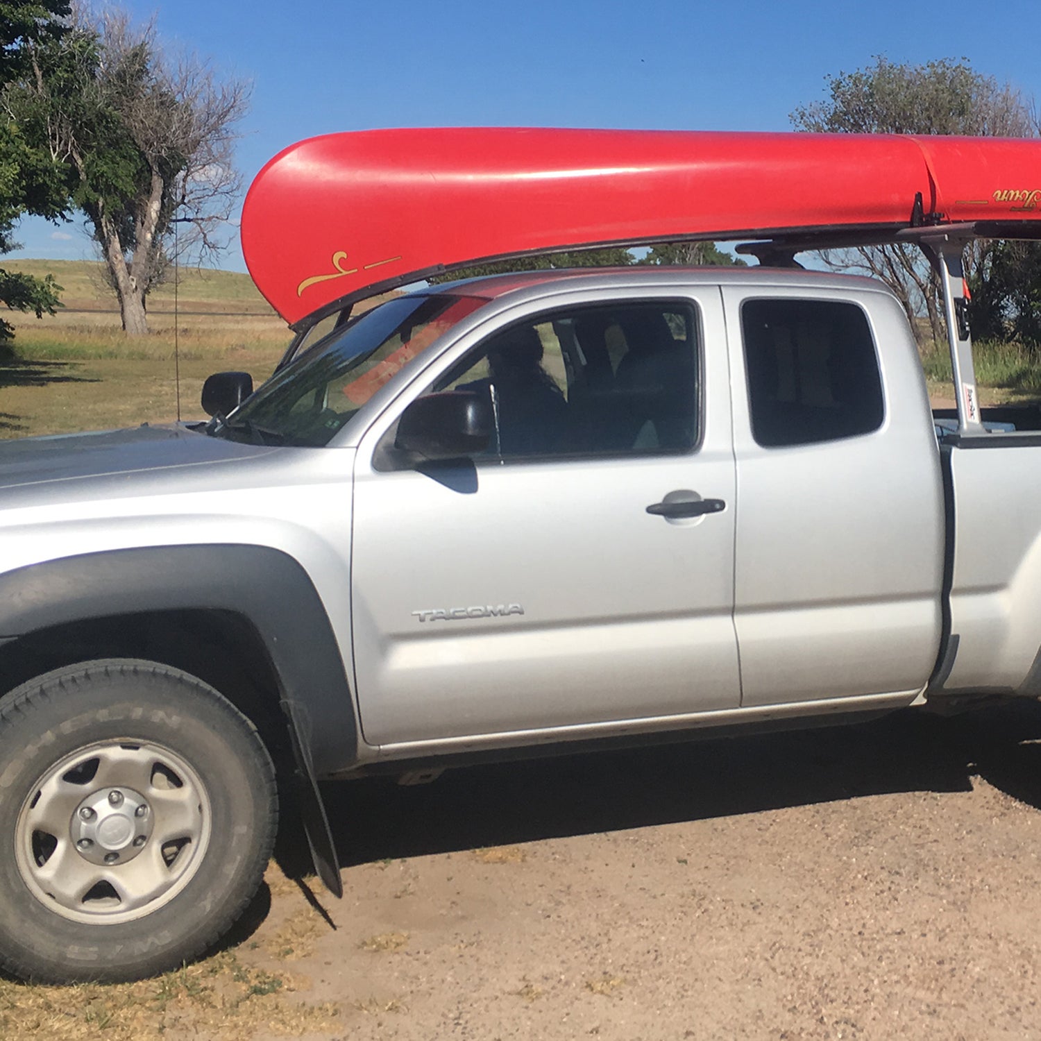 Tacoma with canoe on top