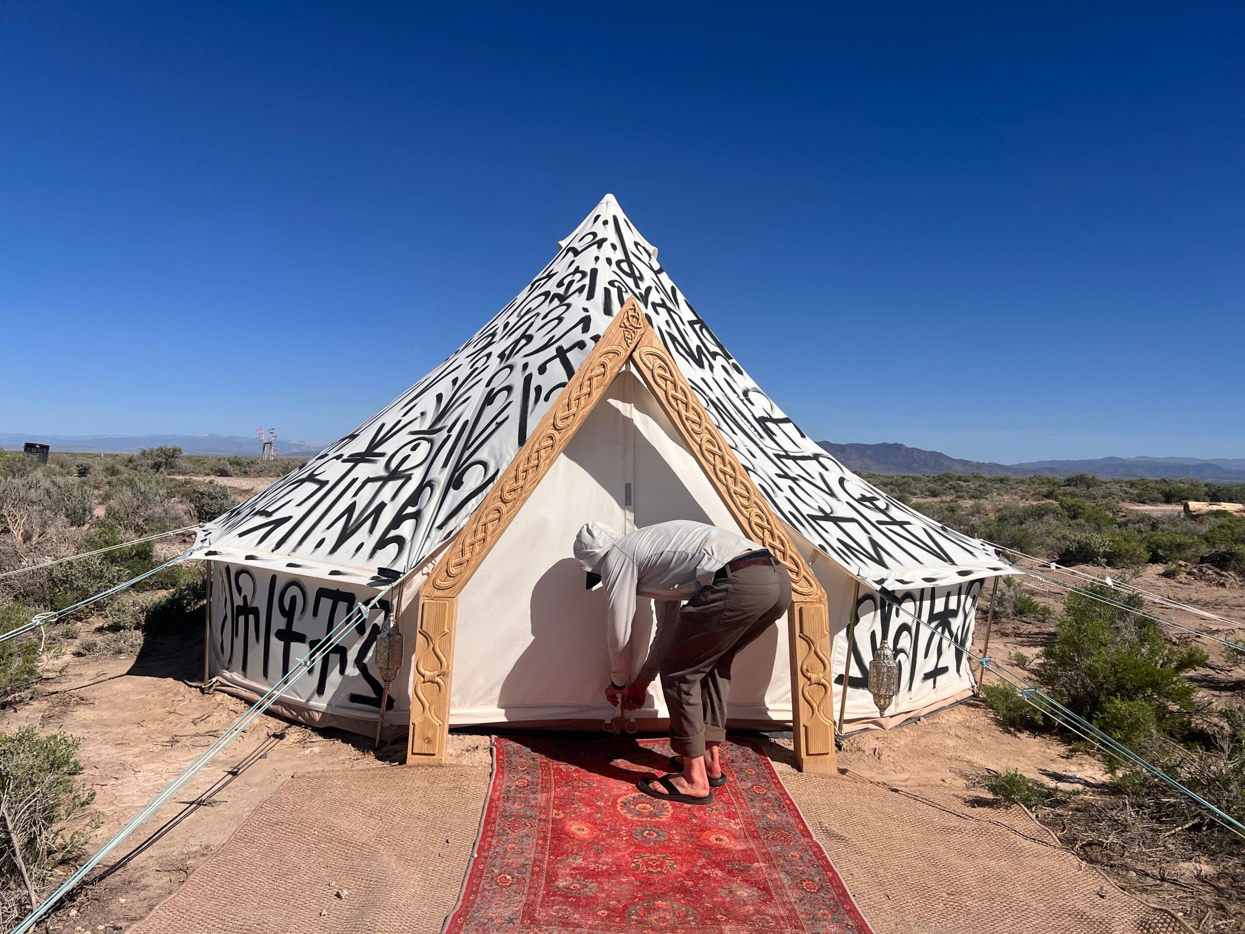 viking tent with man standing outside