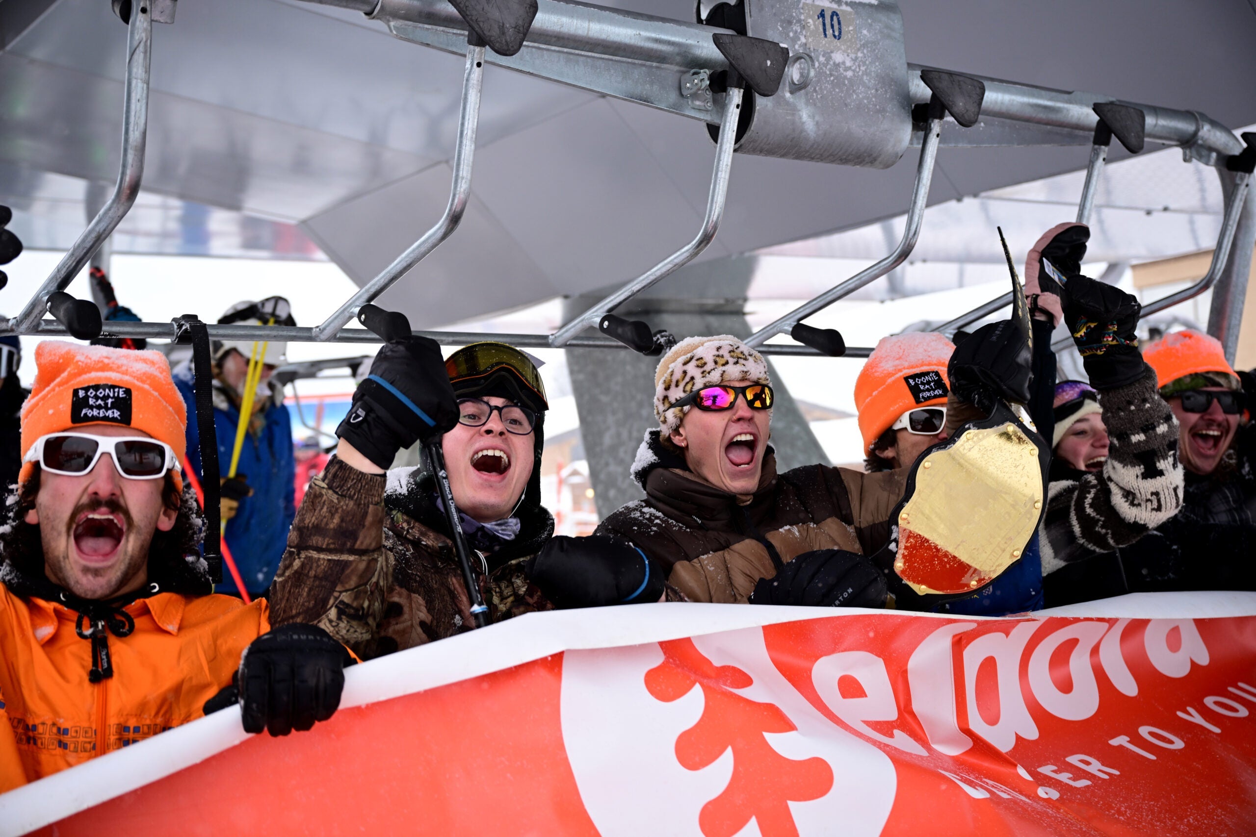 People excited to be on a chairlift at Eldora