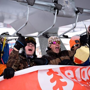 People excited to be on a chairlift at Eldora