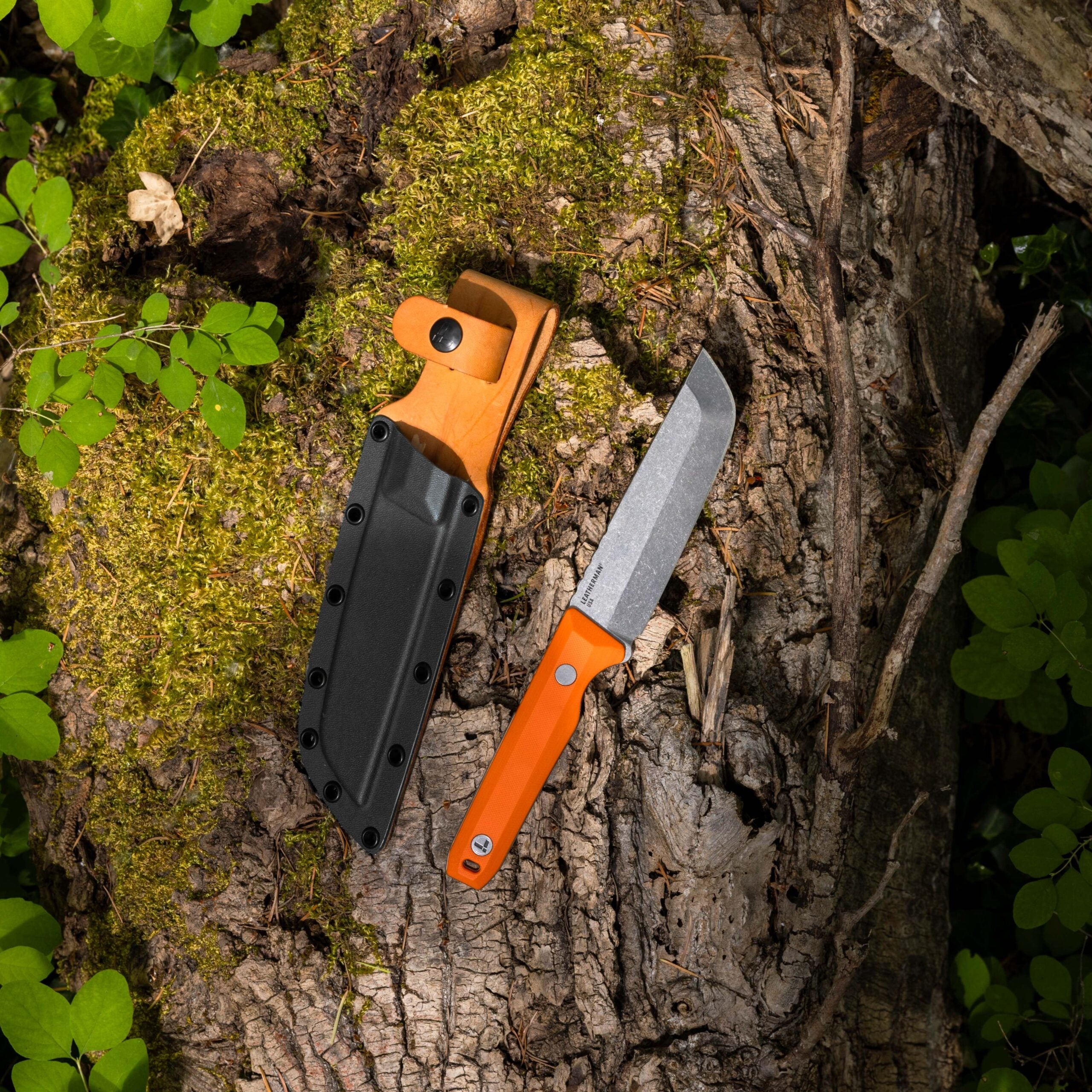 A Leatherman knife on a log