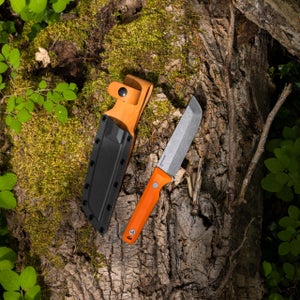 A Leatherman knife on a log