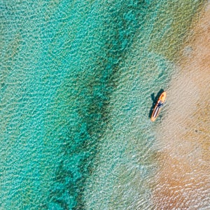 Torch Lake, Michigan Noted for its exceptional beauty; its waters are unusually clear and exhibit a bright turquoise hue, often resembling Caribbean waters.