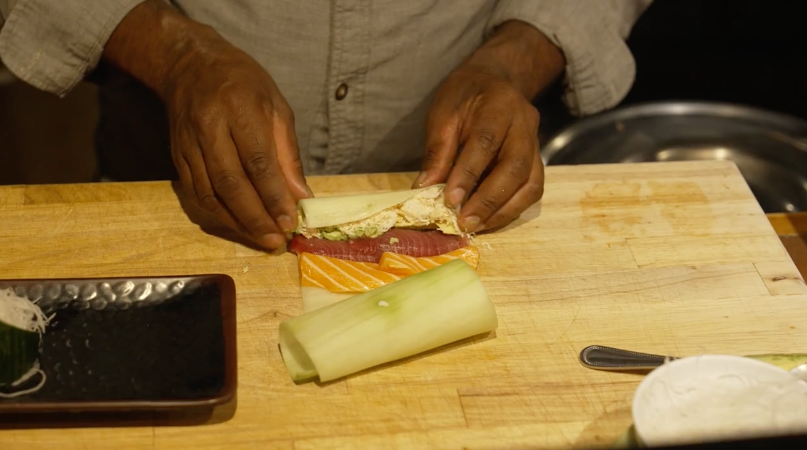 Chef Frankie of Sabaku Sushi teaches Biju how to piece together the delicate arch roll