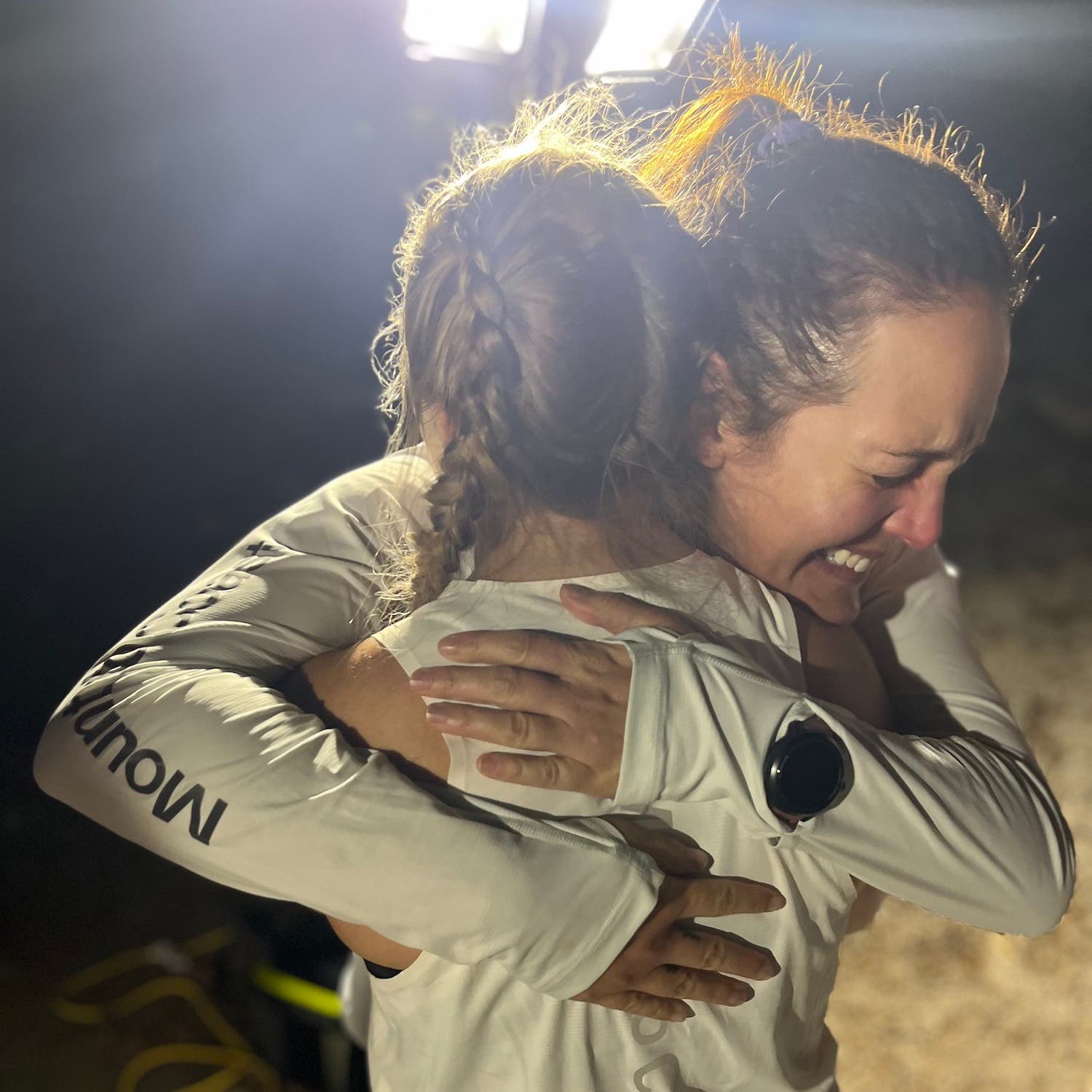 Sisson and Frederick hugging