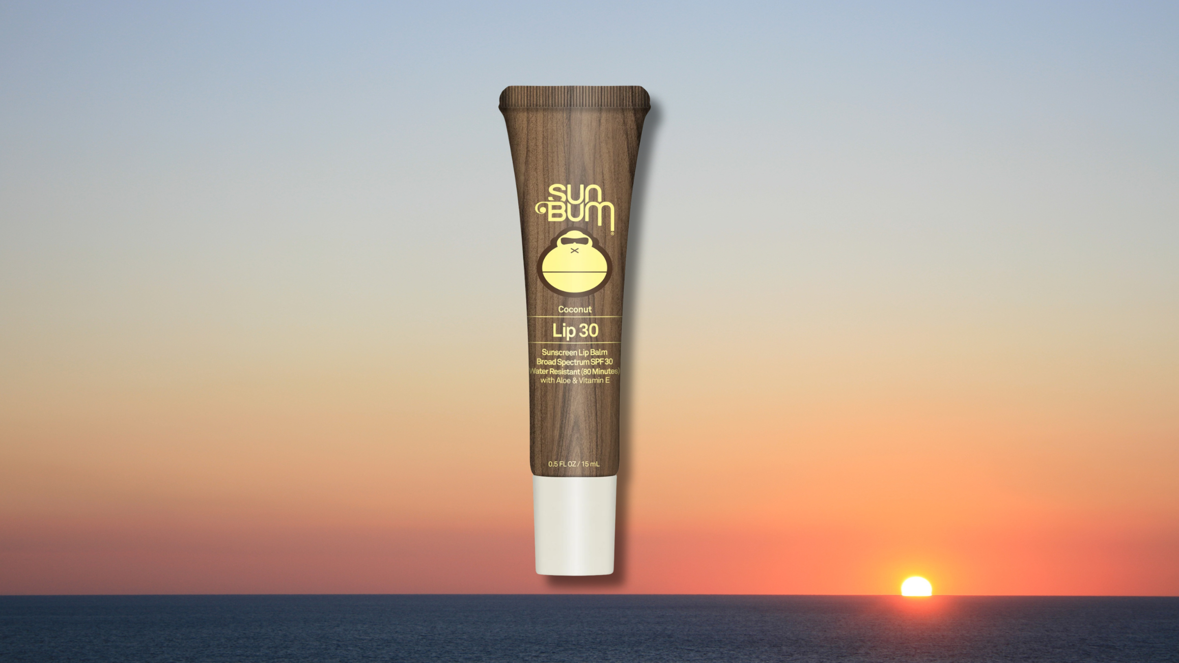 Sun bum spf lip balm on a beach sunset background