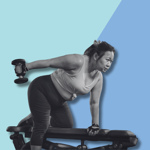 woman doing triceps exercises; triceps kickbacks on bench