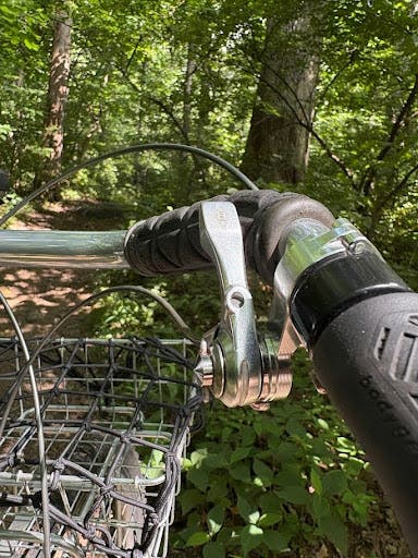 When downshifting with the OM-1, the chain flew right up the cassette with the flick of the lever, and because of the low-normal action, front and rear shifting actions now matched. With the Silver shifters in under-the-bar-thumbie mode, that meant forward to downshift, and back to upshift, on both the front and the rear. 