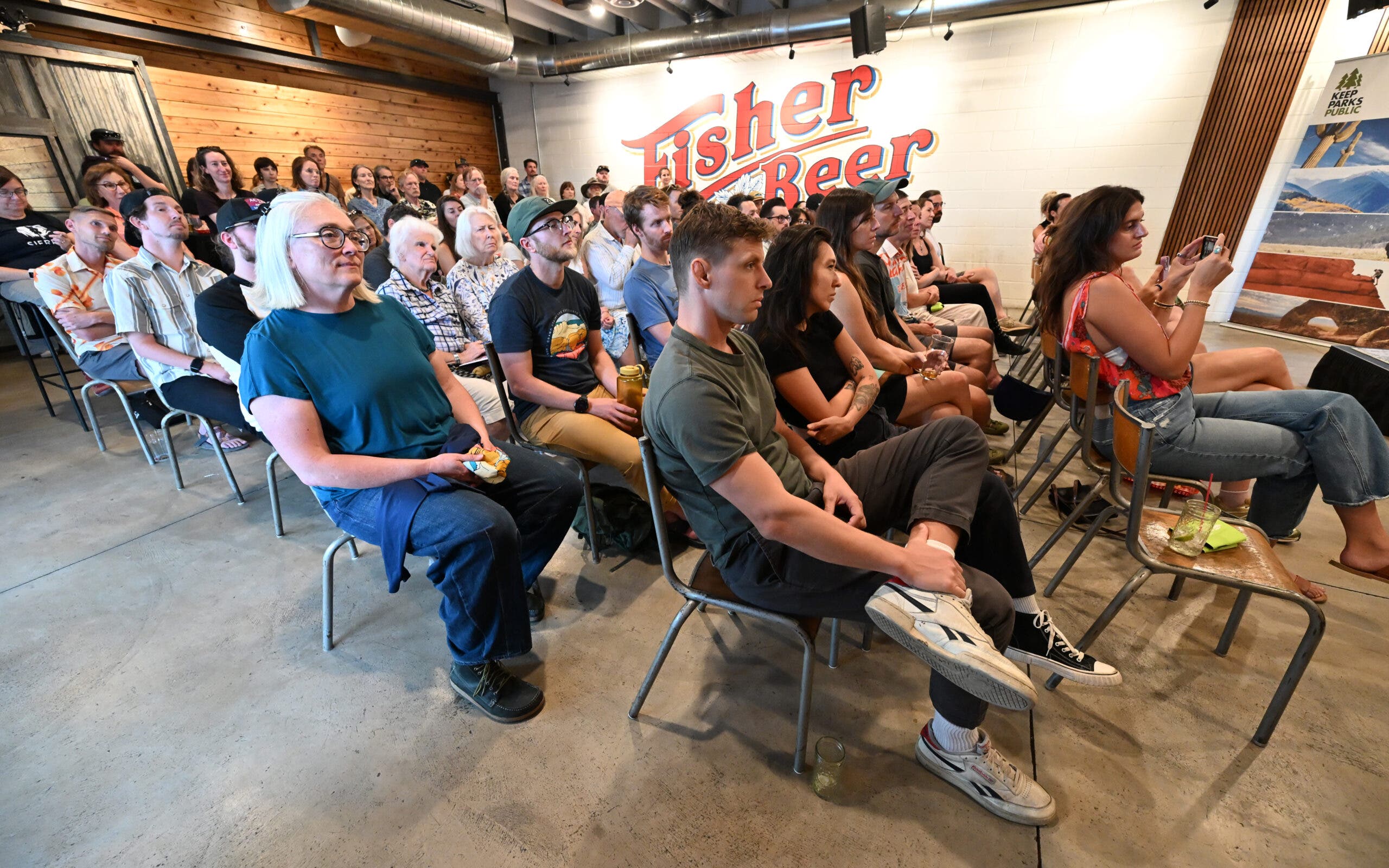 Attendees look on at the event hosted by Center for Western Priorities