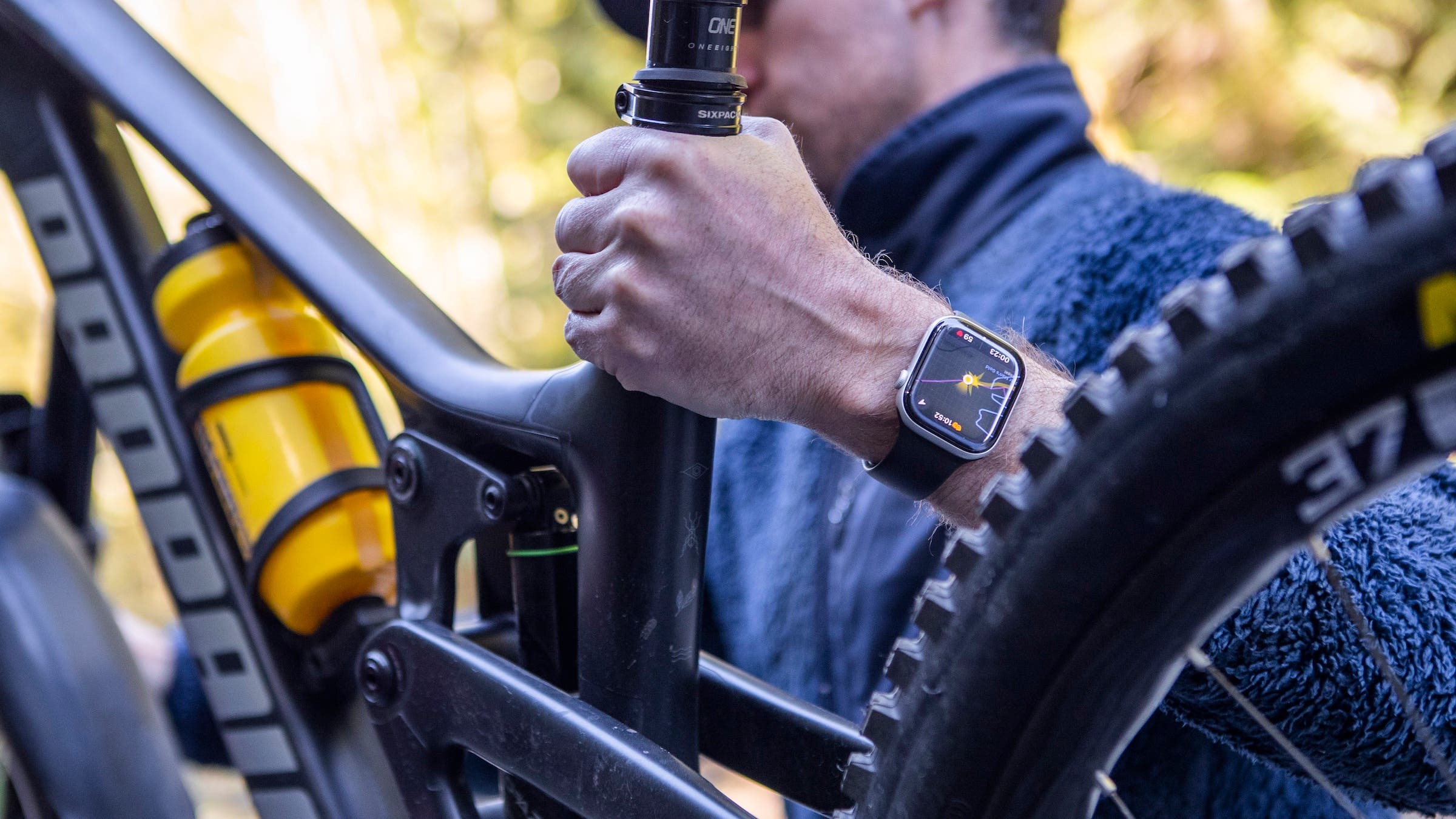 apple watch in front of bike