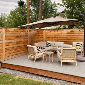 umbrella and patio set on raised deck