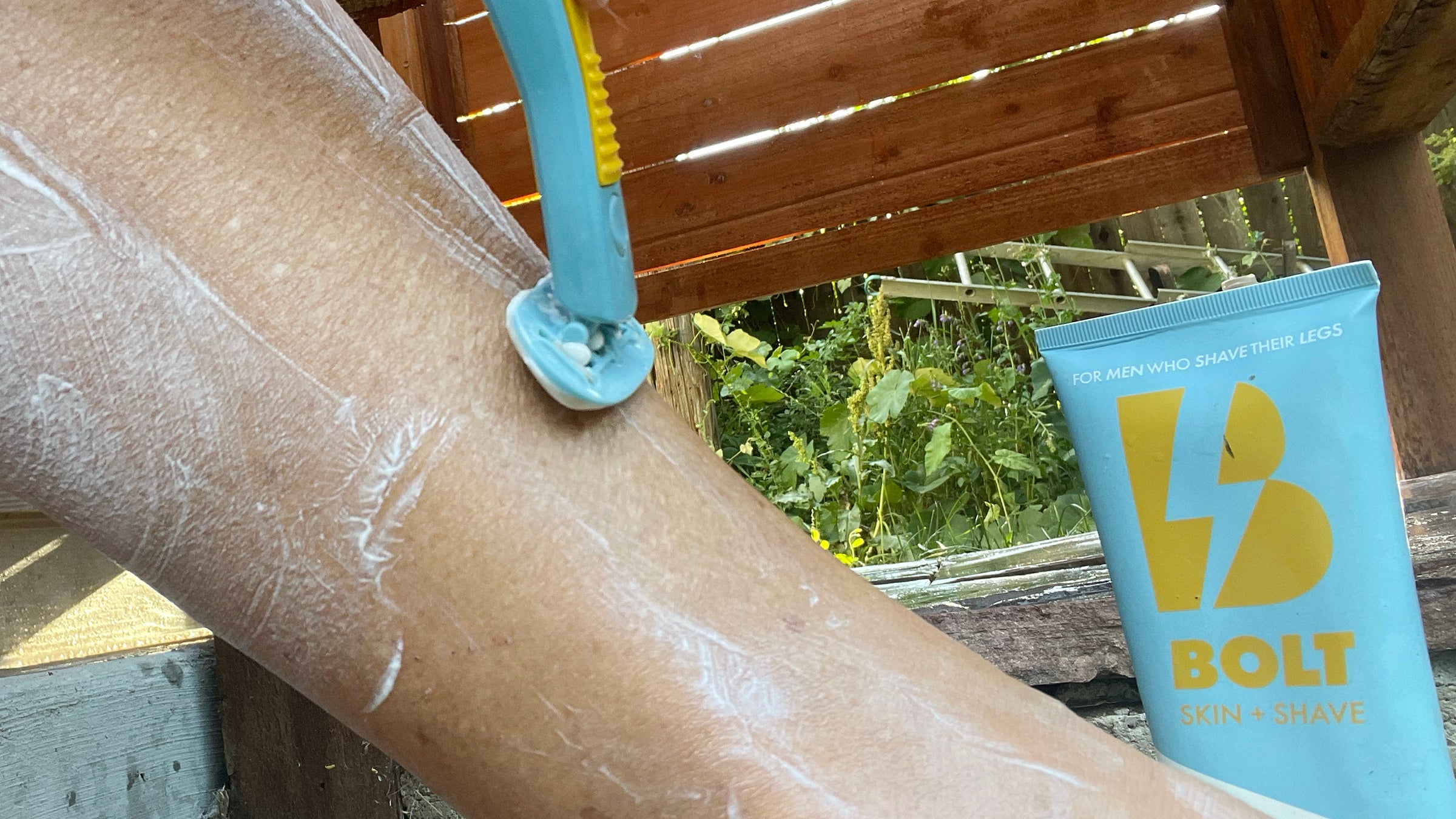shaving a leg with Bolt razor designed for men's legs