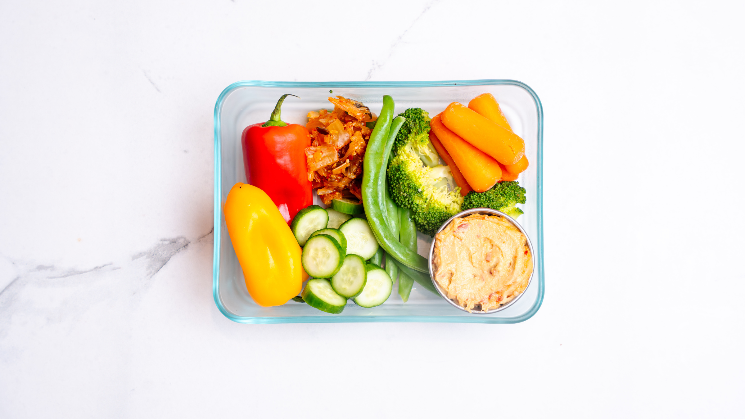 crudite high fiber recipe, vegetables and hummus in a container