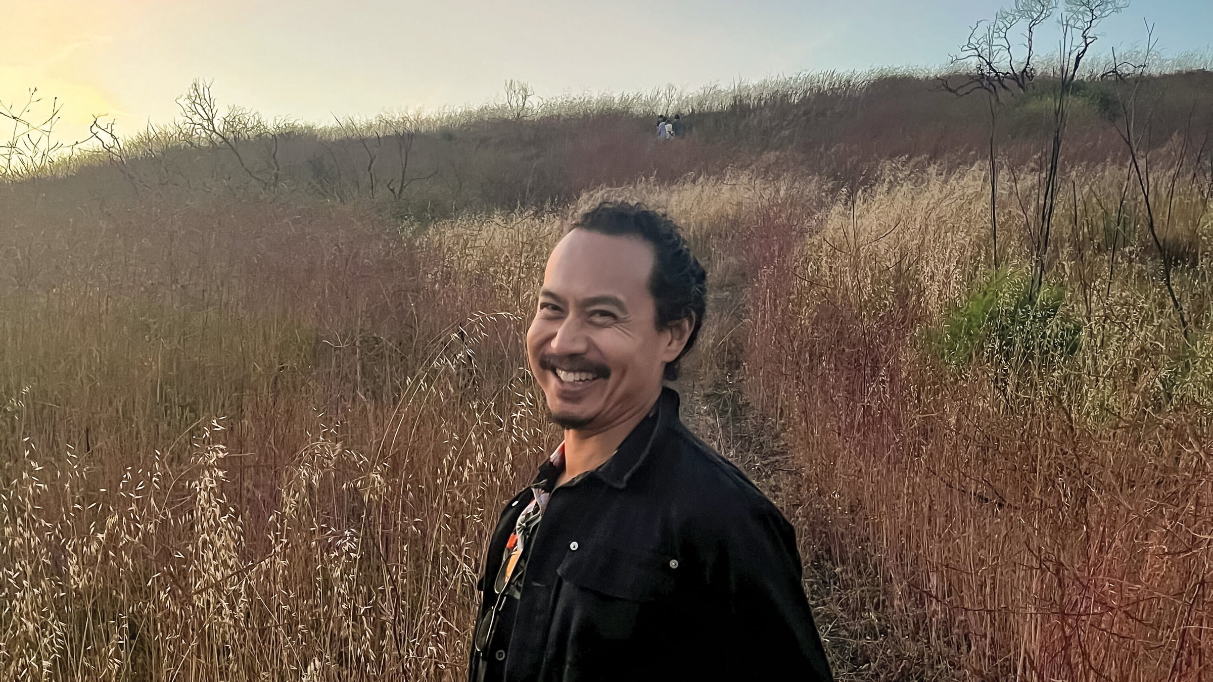Kevin Sintumuang in a field