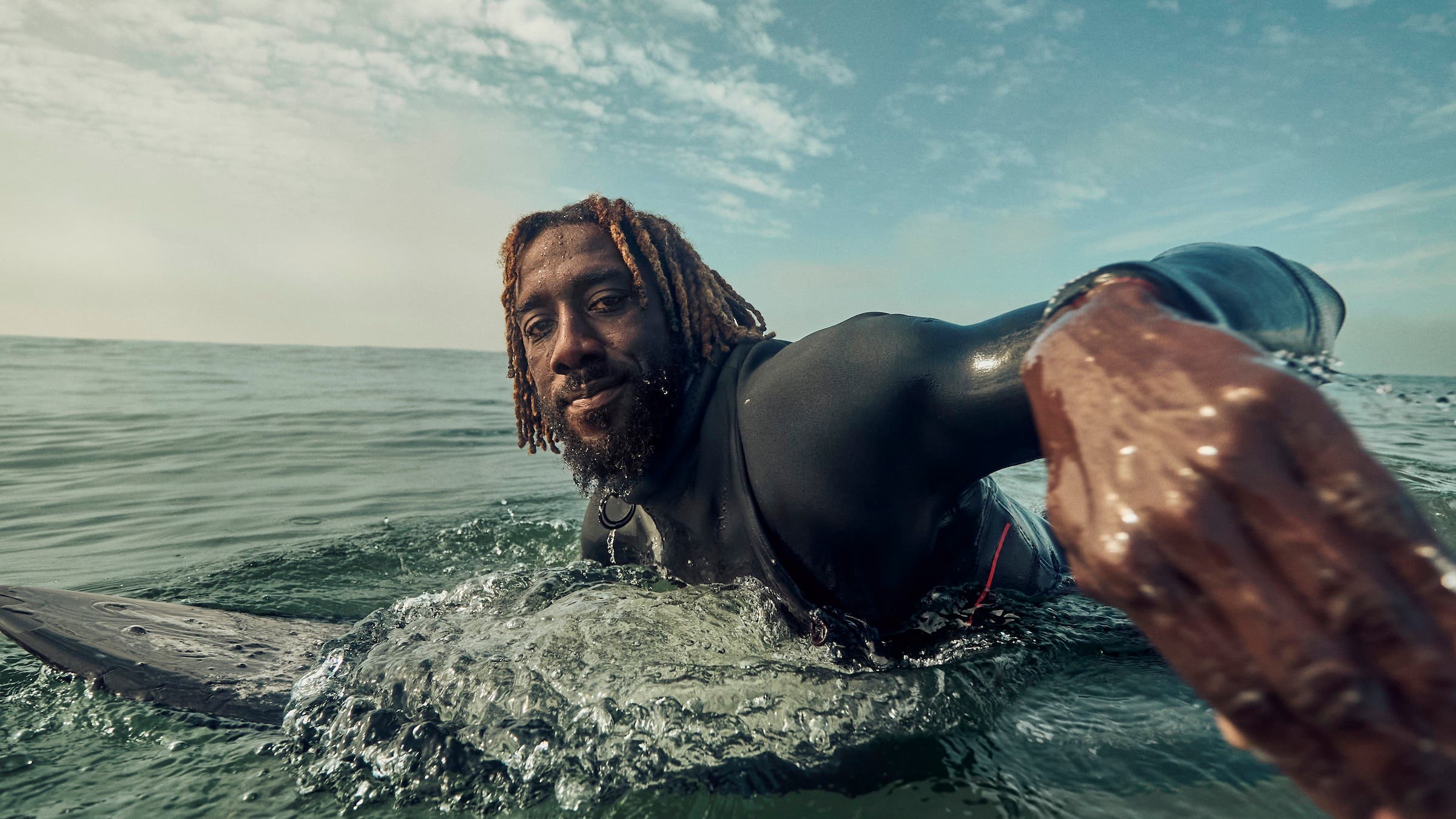 closeup of surfer looking at cam
