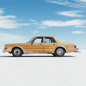sedan adventure vehicle parked on salt flats