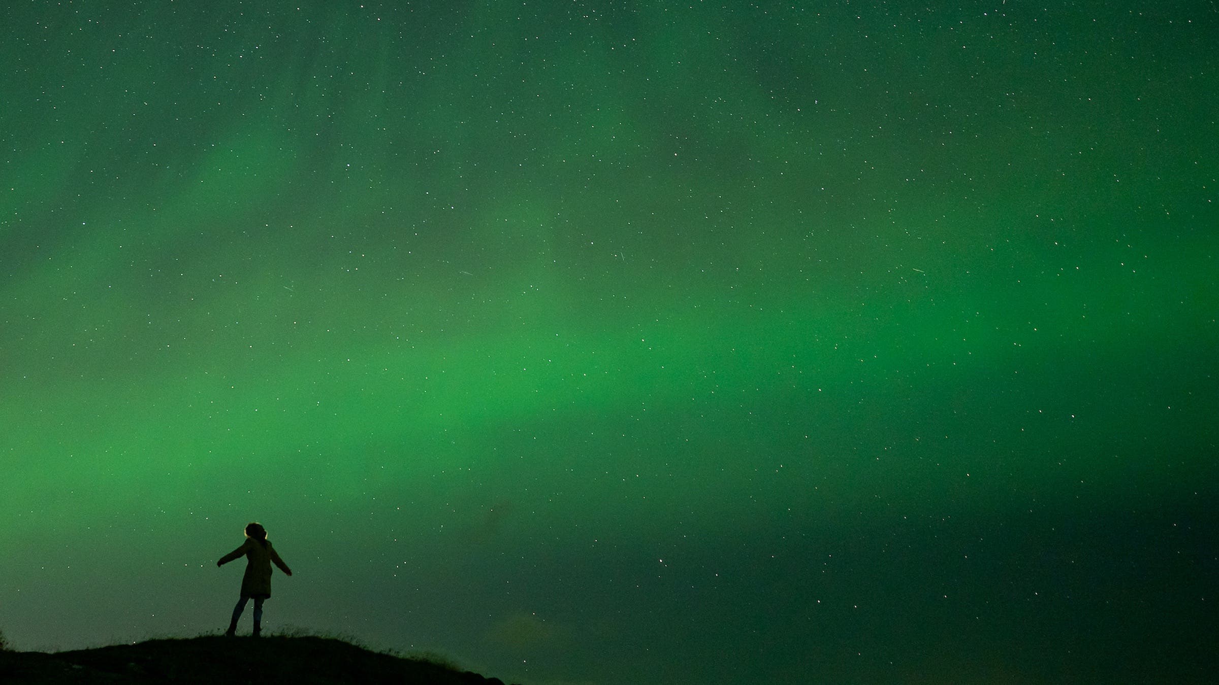 The author beneath northern lights in northern Iceland