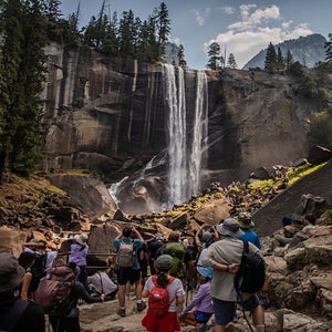 Visitors hike the Mist Trail toward Vernal Falls in August 2025 in Yosemite National Park