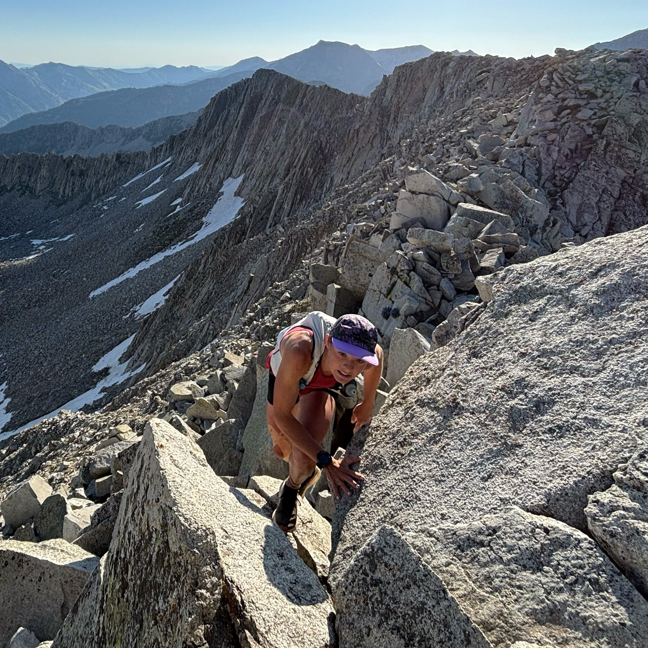 Jane Maus hikes through a rocky landscape