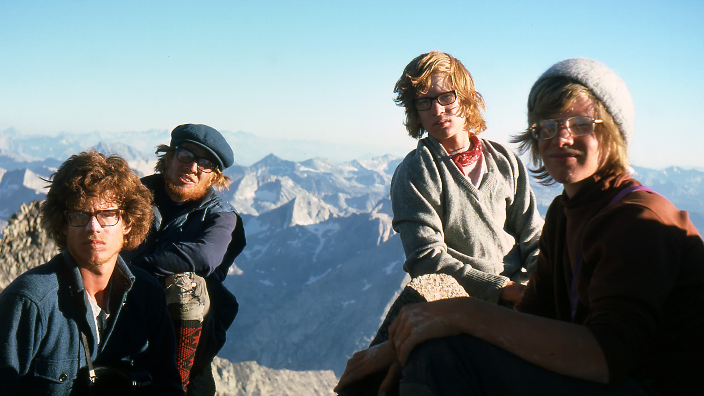 The Smith brothers celebrate on a summit during their 1974 trip