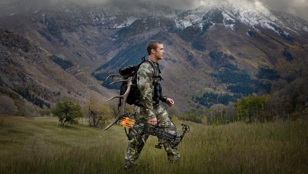 man with bow and arrow