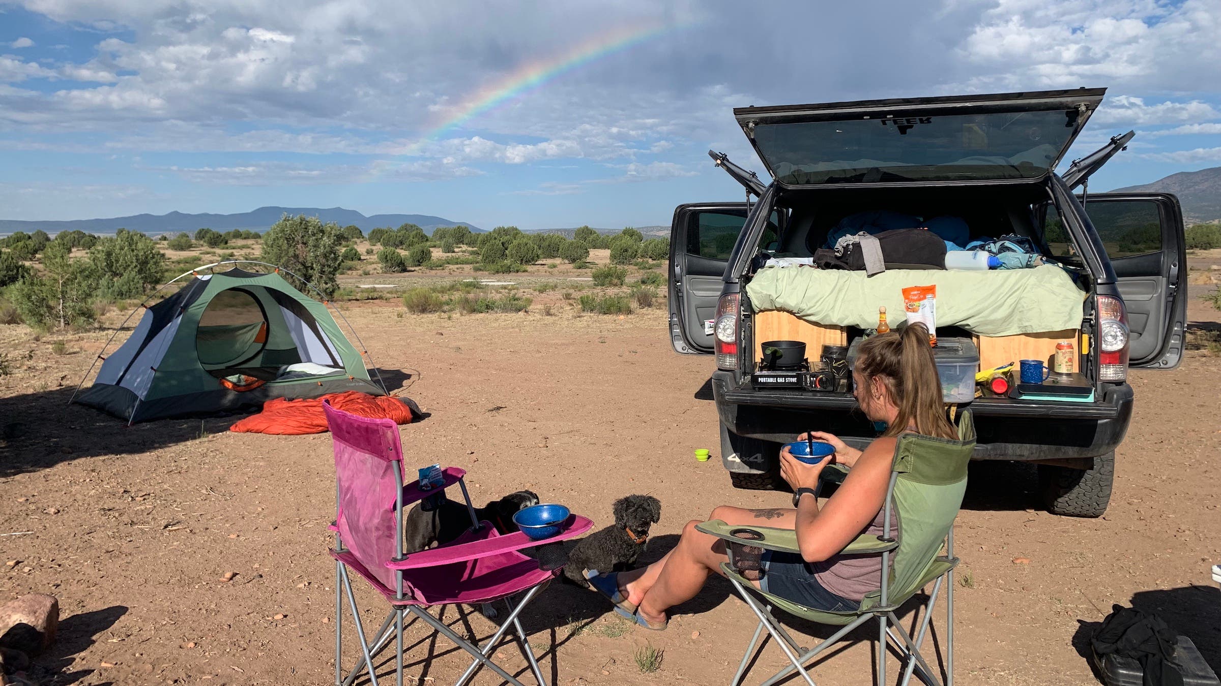 woman with truck and tent