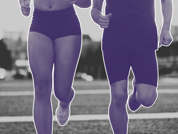 man and woman running side by side front view