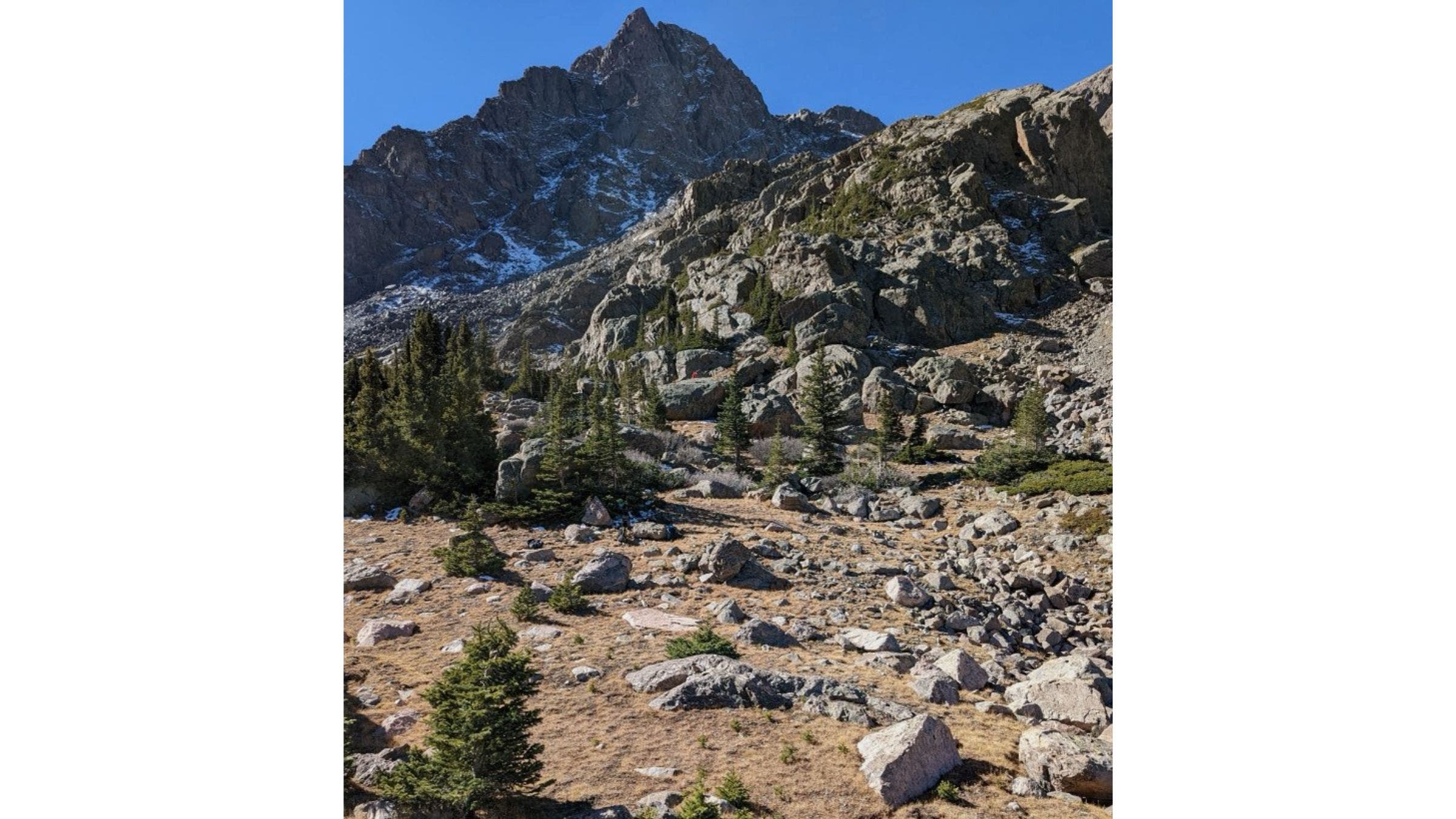 mountain terrain against blue sky
