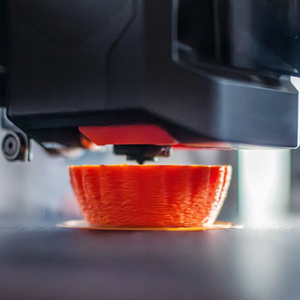 3D printer working on a backpacking tool