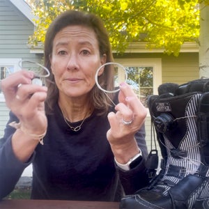 woman holding up replacement BOA laces