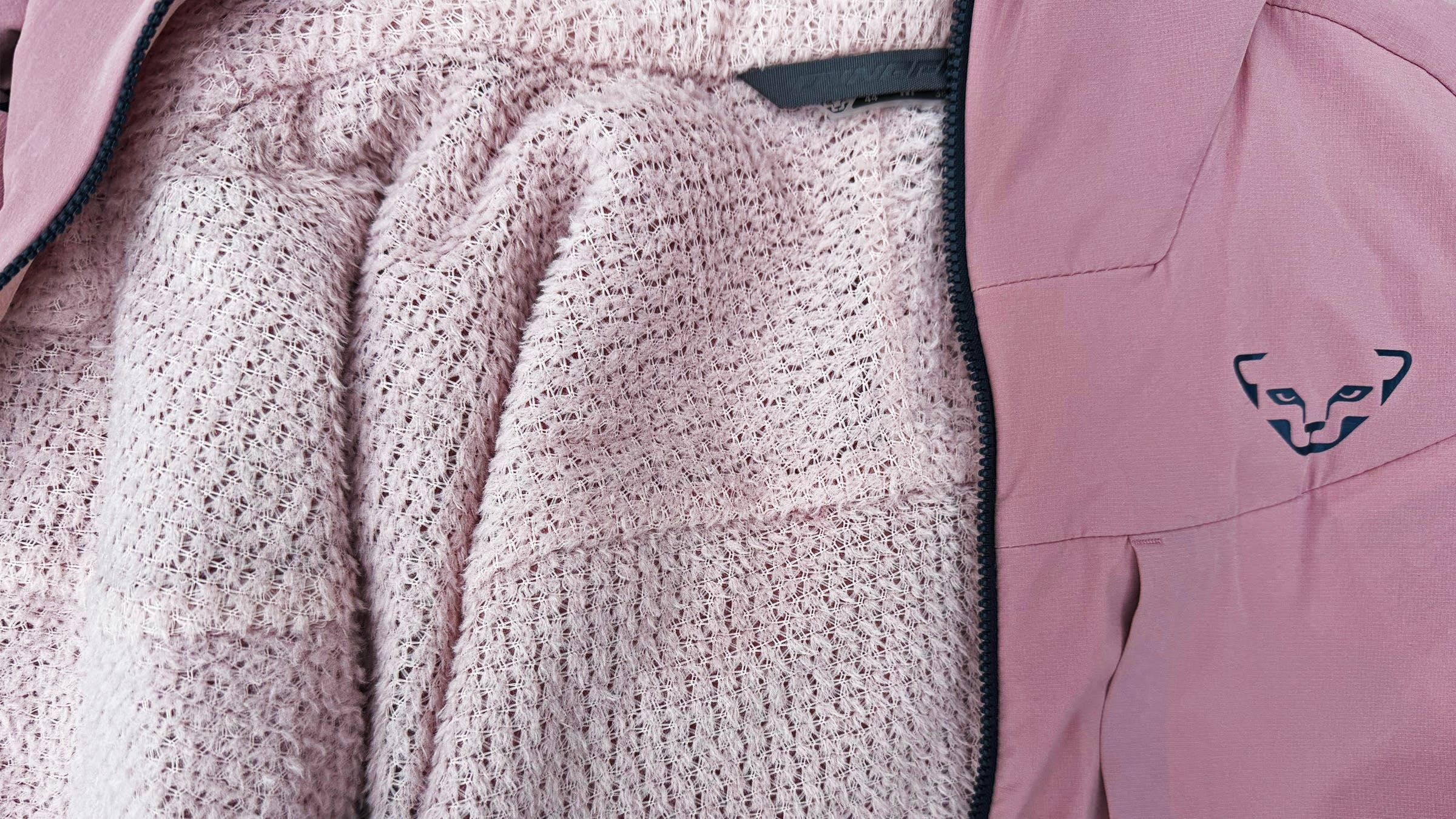 Dynafit Tigard Alpha Direct Jacket, tested and named one of Outside's best women's midlayers in 2026.