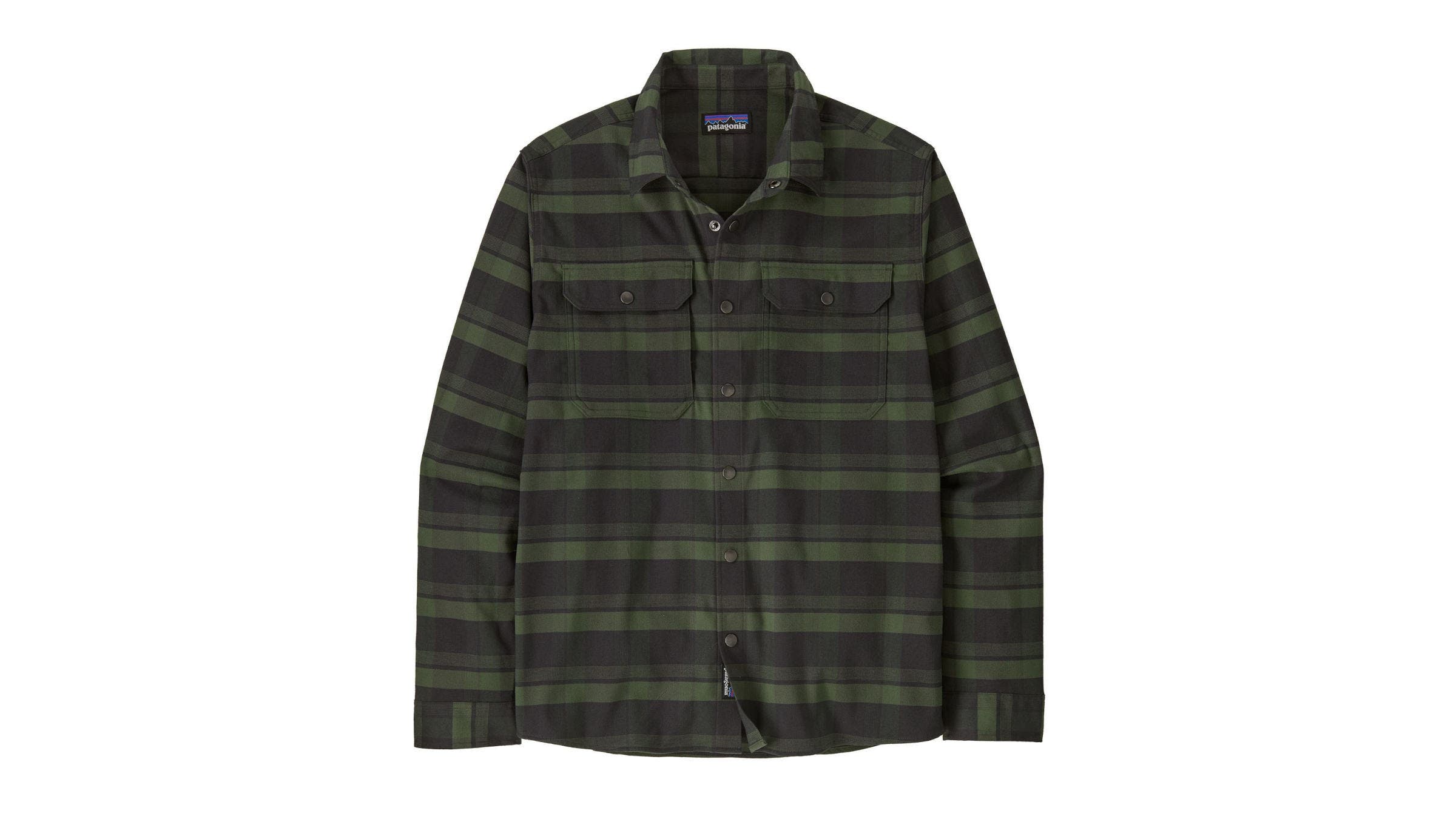 A flat-lay view of the Patagonia Canyonite Flannel, showcasing its dark green and black horizontal plaid pattern and dual chest pockets as one of the best flannel shirts for men for technical outdoor use.