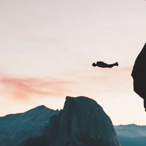 base jumping in sunset