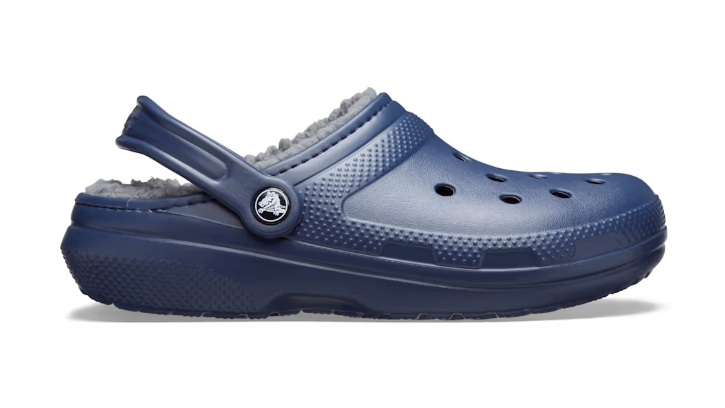 navy blue lined Crocs shoe on white background